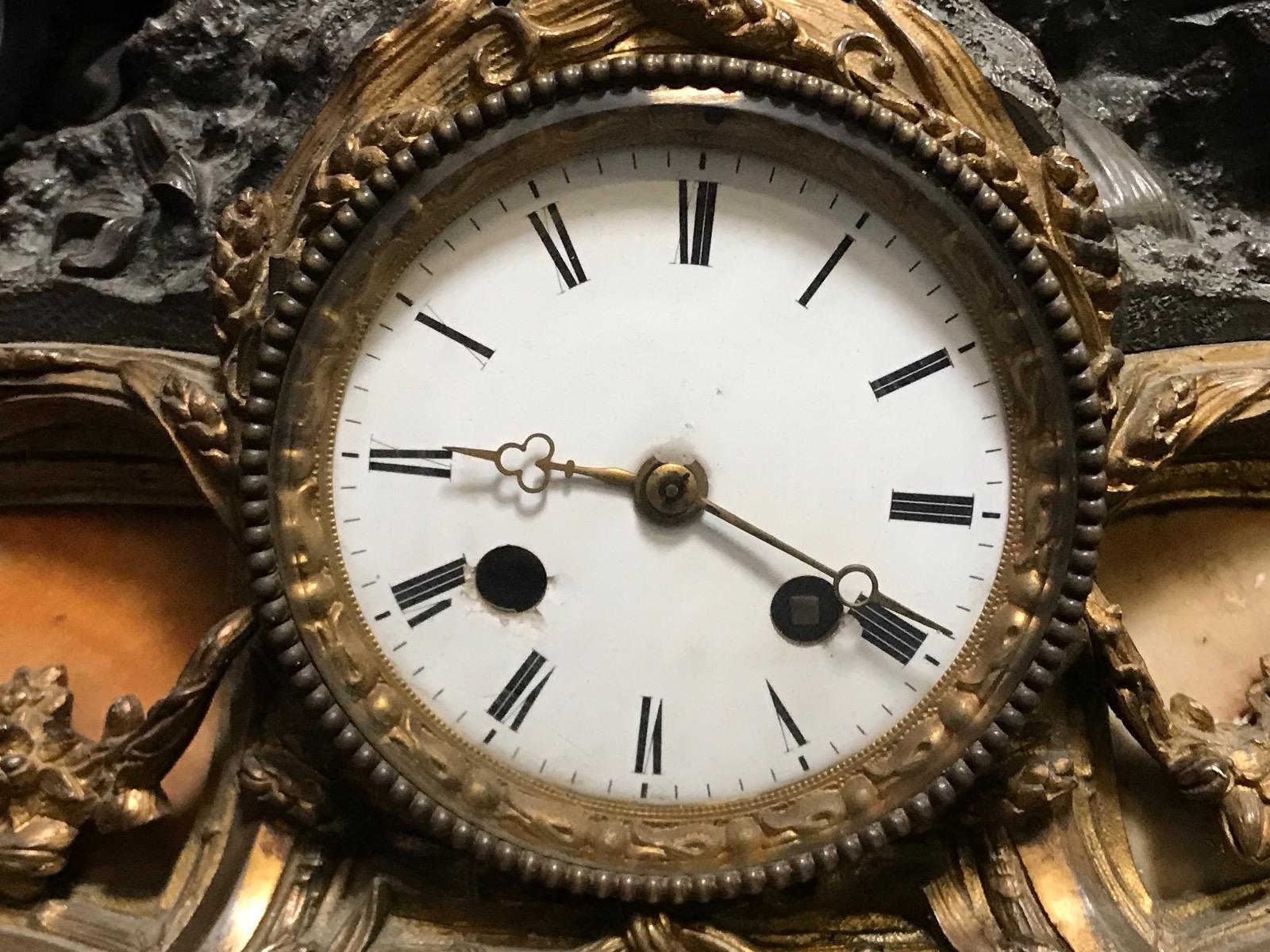 Antique bronze clock