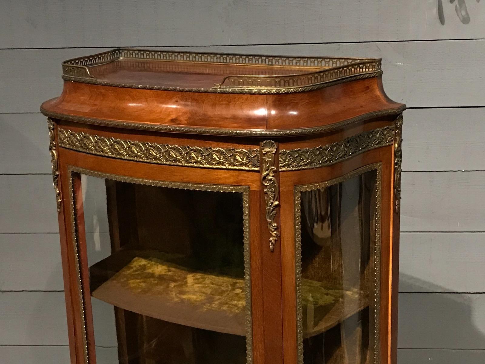 Antique curved mahogany display cabinet with bronzes Transition Louis XV/Louis XVI Style 