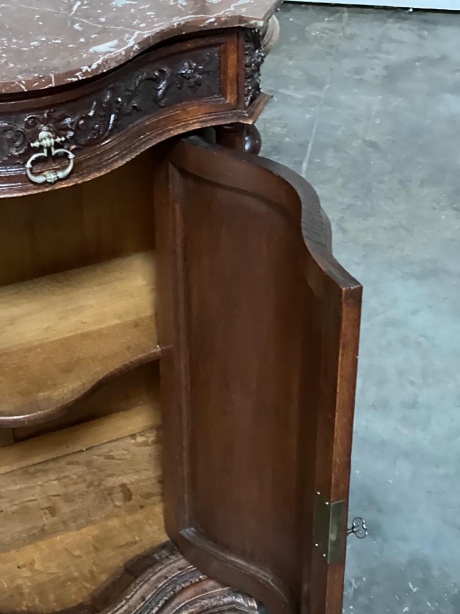 Fine carved cabinet with marble top 