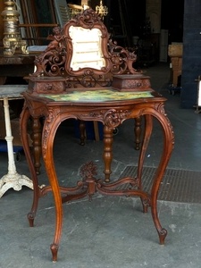 Louis XV style Fine carved french walnut vanity with putti