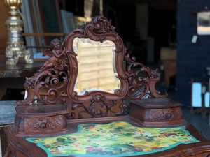 Louis XV style Fine carved french walnut vanity with putti