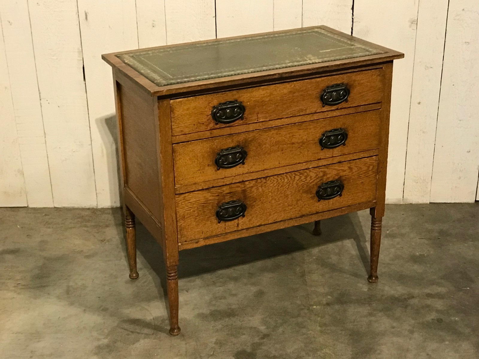 Small english chest of drawers with leather top