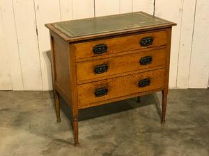 Small english chest of drawers with leather top