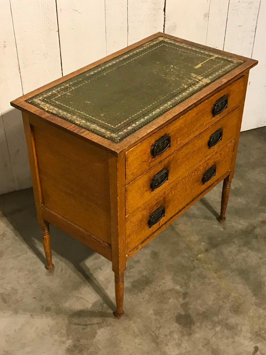 Small english chest of drawers with leather top