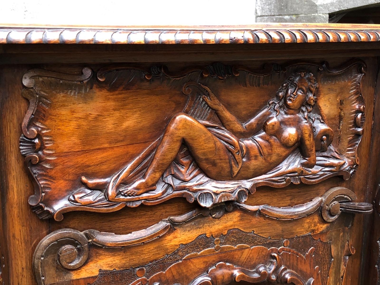 Walnut carved renaissance cabinet 