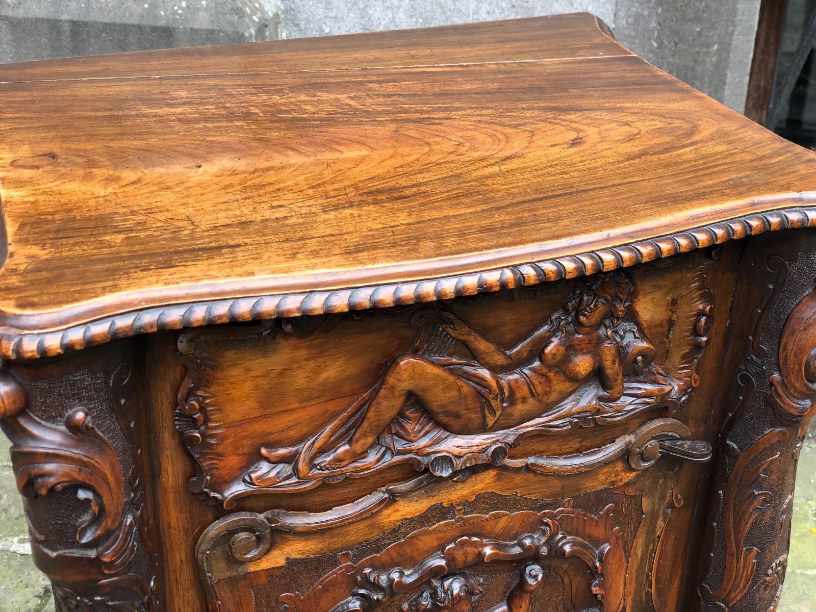 Walnut carved renaissance cabinet 